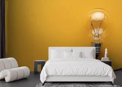 Hanging Light Bulb on Yellow Wall Wall mural