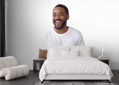 man laughing smiling as he wears white tshirt Wall mural