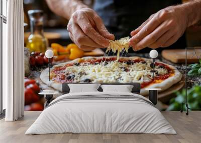 Preparing a fresh cheese pizza with herbs and tomato sauce at home in the kitchen Wall mural