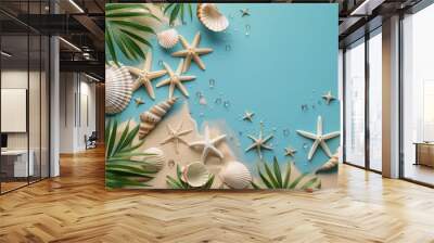 Seashells and Starfish on Blue Sand With Palm Leaves Wall mural