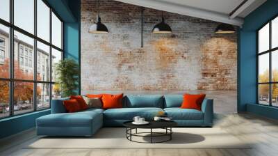 Stylish industrial lighting hanging over a rustic brick wall in a modern interior space Wall mural