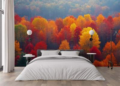 Vibrant autumn foliage in a dense forest with colorful red, orange, and yellow leaves Wall mural