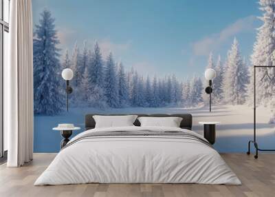 Winter landscape with snow-covered trees and clear blue sky in a tranquil forest setting Wall mural