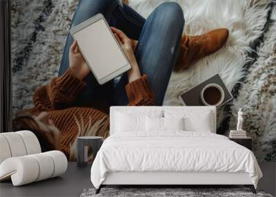 Woman Using Tablet on Fuzzy Rug While Sitting on Floor Wall mural