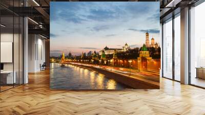 The Moscow Kremlin in sunset. Bell tower. Embankment. Car traces Wall mural