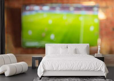 Empty tabletop on brick wall background with tv Wall mural