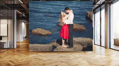 Charming bride, elegant groom on landscapes of mountains and sea Gorgeous wedding couple Wall mural