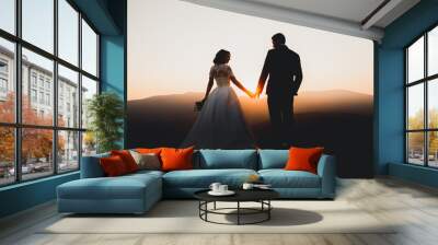 Wedding couple posing on sunset at wedding day. Bride and groom in love Wall mural