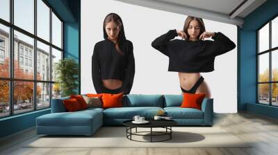 Mockup of fashionable black crop top on sexy girl in hood and panties, bikini, isolated on background in studio. Wall mural