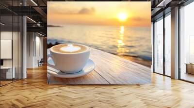 Savor a steaming coffee on a white table with an ocean view at sunset, inviting relaxation and tranquility in a cozy setting. Enjoy the calm nature and tropical charm, perfect for a summer vacation Wall mural