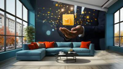 A businessman holding a yellow colored file icon in his hand representing data and network connection concepts  Wall mural