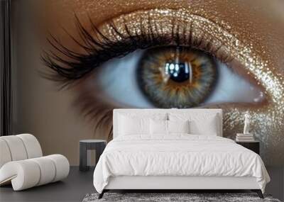 A close-up of a mesmerizing golden eye showcasing radiant makeup techniques with a hint of elegance Wall mural