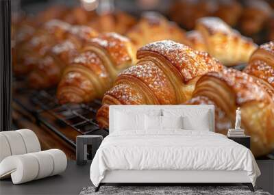 A close-up of freshly baked croissants on a cooling rack, Wall mural