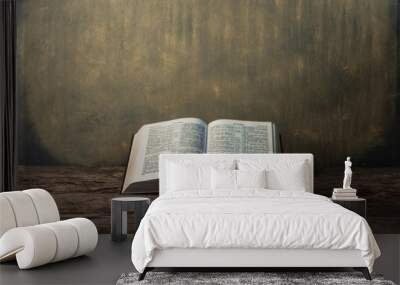 Bible and a crucifix on a old table. Beautiful gold background.Religion concept. Wall mural