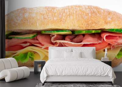 Ciabatta sandwich with lettuce, tomatoes prosciutto and cheese isolated on white background Wall mural