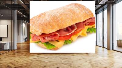 Ciabatta sandwich with lettuce, tomatoes prosciutto and cheese isolated on white background Wall mural