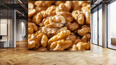 Close-up of a pile of raw, natural walnuts with intact shells. Wall mural