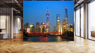 Shanghai skyline at dusk with illuminated Waibaidu bridge, China Wall mural