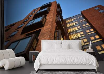 Exterior of a modern multi-storey residential building made of bricks in a Scandinavian style in Copenhagen, Denmark Wall mural