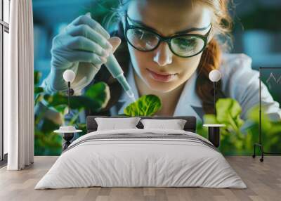 female scientist with pipette and petri dish studying green spinach and other plants Wall mural