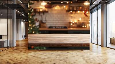 Festive kitchen backdrop with empty wooden table in foreground, Christmas tree and twinkling lights creating a warm, cozy atmosphere for holiday cooking and gatherings. Wall mural