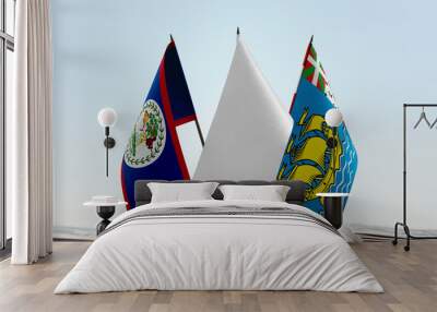 Flags of Belize and Saint Pierre and Miquelon with a white flag in the middle Wall mural