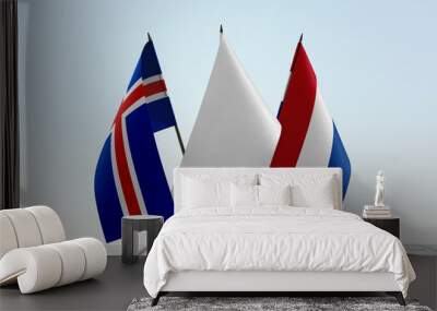 Flags of Iceland and Netherlands with a white flag in the middle Wall mural