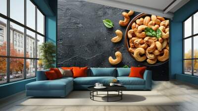 Homemade roasted salted cashews served in a bowl Wall mural