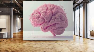 human brain made of pink knitting threads on a light background Wall mural