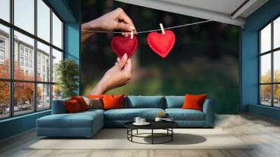 Valentine's day concept with two red hearts Wall mural