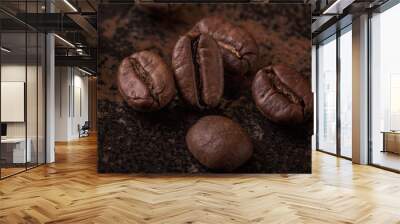 Coffee beans  on stone background. Top view with copy space for your text. Roasted coffee beans background. Beans texture, macro Wall mural