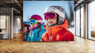 Teenagers have winter fun sport activities in snowy mountains Wall mural