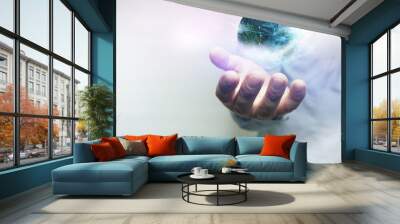 Protect our world in human hands and nebula dust. Mixed media. Wall mural