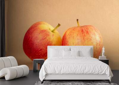 Two red apples on kraft paper, macro. Wall mural