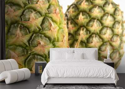 Two ripe organic pineapples, close-up, isolated on white. Wall mural