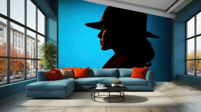 Silhouette of a mysterious female spy in a hat Wall mural