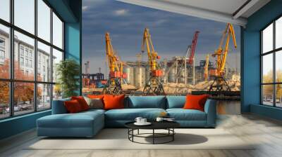 Lifting cargo cranes, ships and grain dryer in Sea Port of Odessa, Black Sea, Ukraine Wall mural