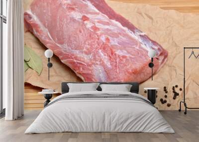 A piece of raw meat on a cutting kitchen table Wall mural