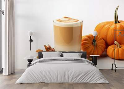 Autumn coffee latte in a transparent glass cup with cinnamon and pumpkins on a white background. Wall mural