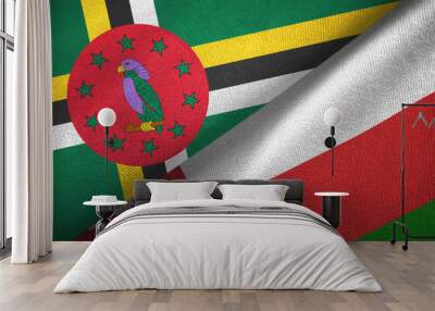 Dominica and Oman two flags textile cloth, fabric texture Wall mural