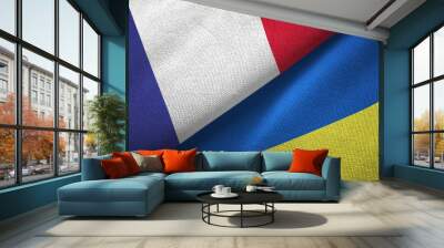 France and Ukraine two flags textile cloth, fabric texture Wall mural