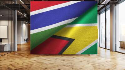 Gambia and Guyana two flags textile cloth, fabric texture Wall mural