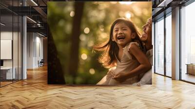 A heartwarming scene capturing the pure joy and connection between a happy girl and her loving father. Wall mural