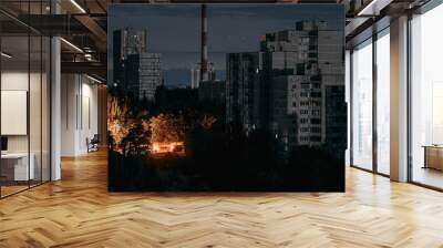 Panel residential buildings during blackout of electricity at night. View on a panel residential buildings during blackout of electricity at night. Night city skyline. Outage of the power. Wall mural