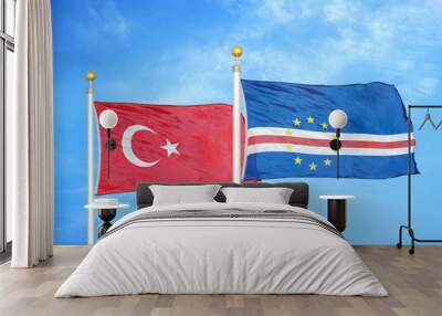 Turkey and Cape Cabo Verde two flags on flagpoles and blue cloudy sky Wall mural