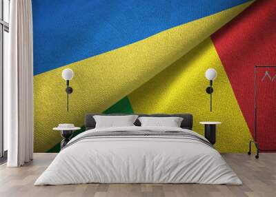 Ukraine and Mali two flags textile cloth, fabric texture Wall mural