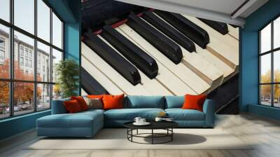 Keyboard, keys of the old broken piano with a vintage feel backg Wall mural