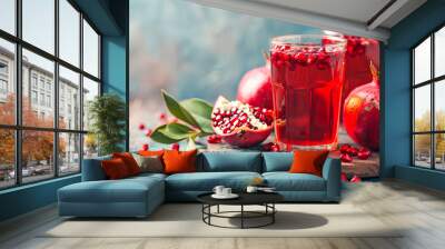 Board with glass of fresh pomegranate juice on colorful background Wall mural