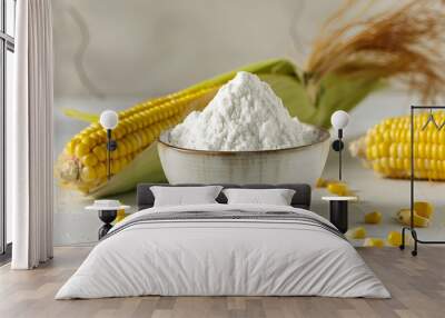 Bowl with corn starch, ripe cobs and kernels on white table Wall mural