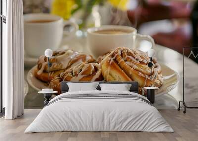 Cinnamon rolls paired with a latte during afternoon tea Wall mural